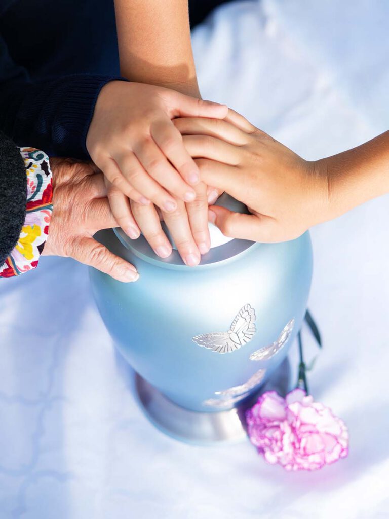 hands on urn