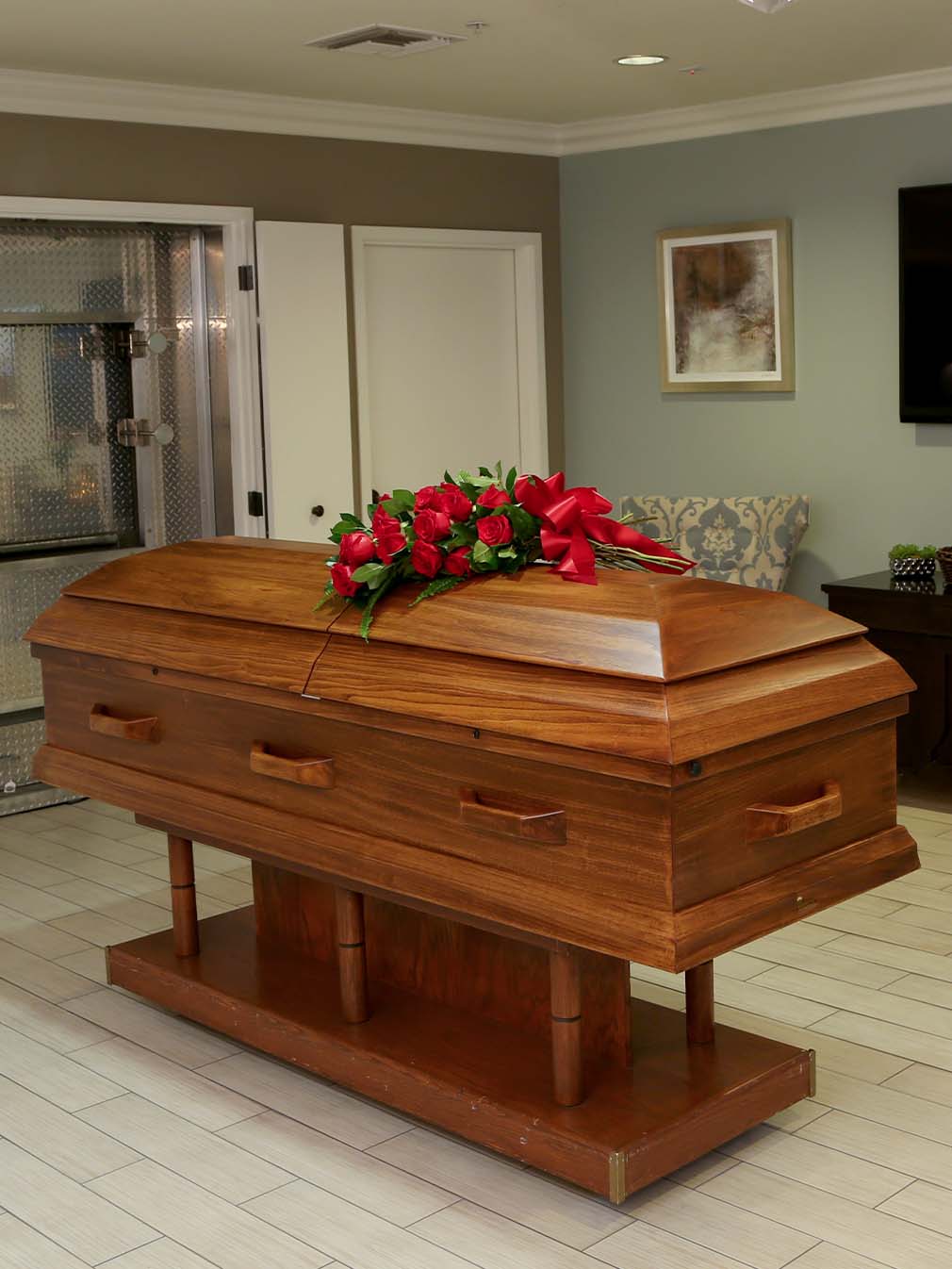 wood casket with roses